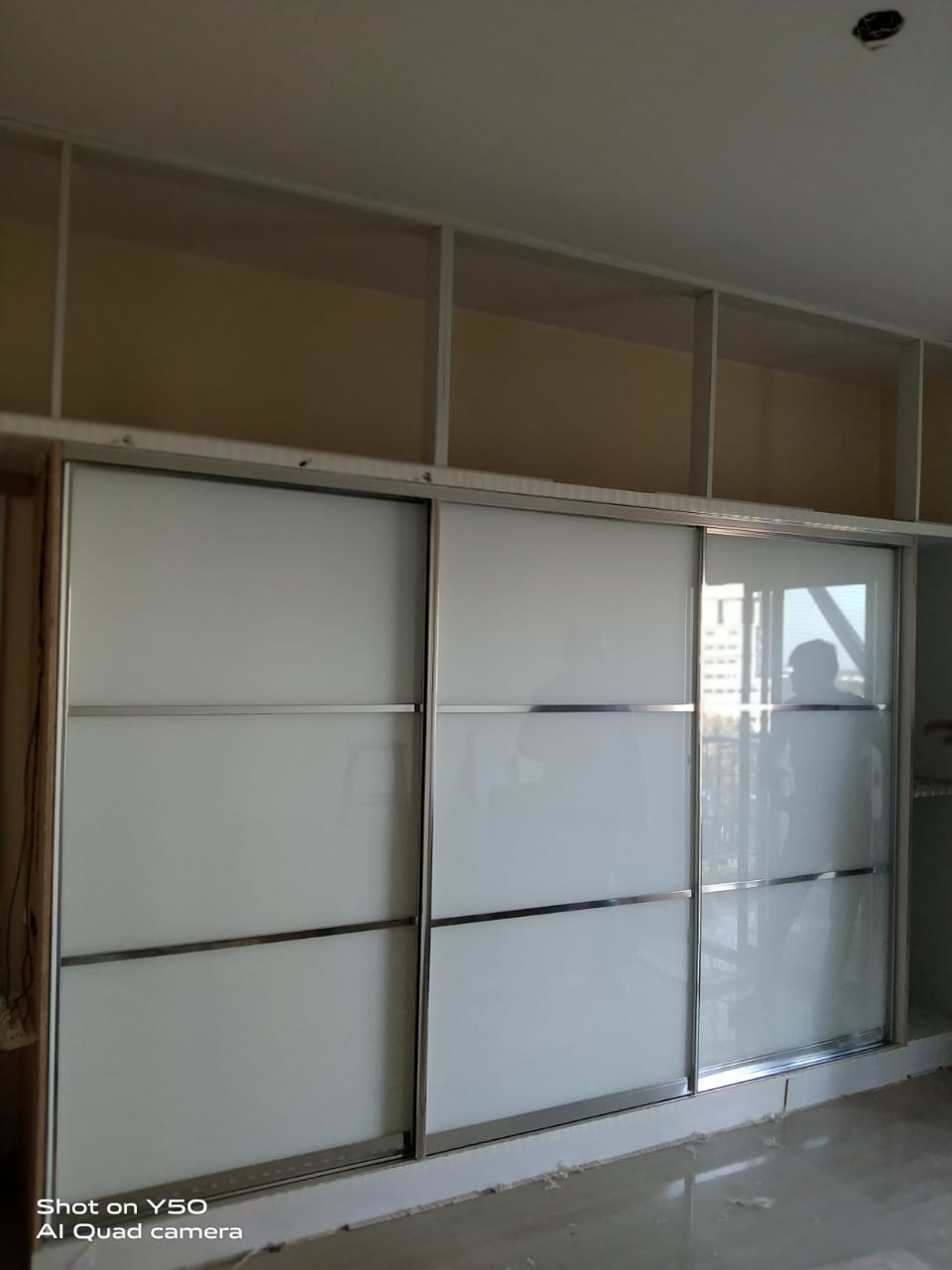 Designer glass and timber wardrobe