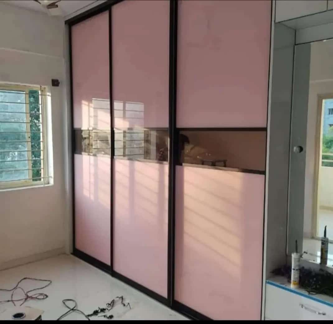 Designer glass and timber wardrobe