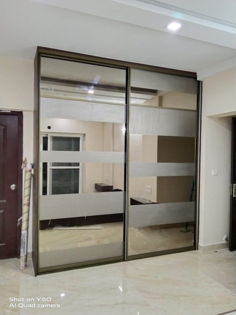 Designer glass and timber wardrobe
